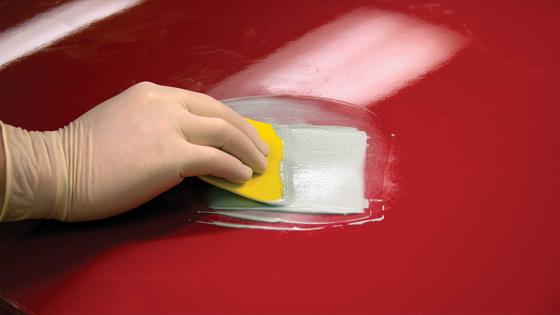 Evercoat Rage Ultra on red surface